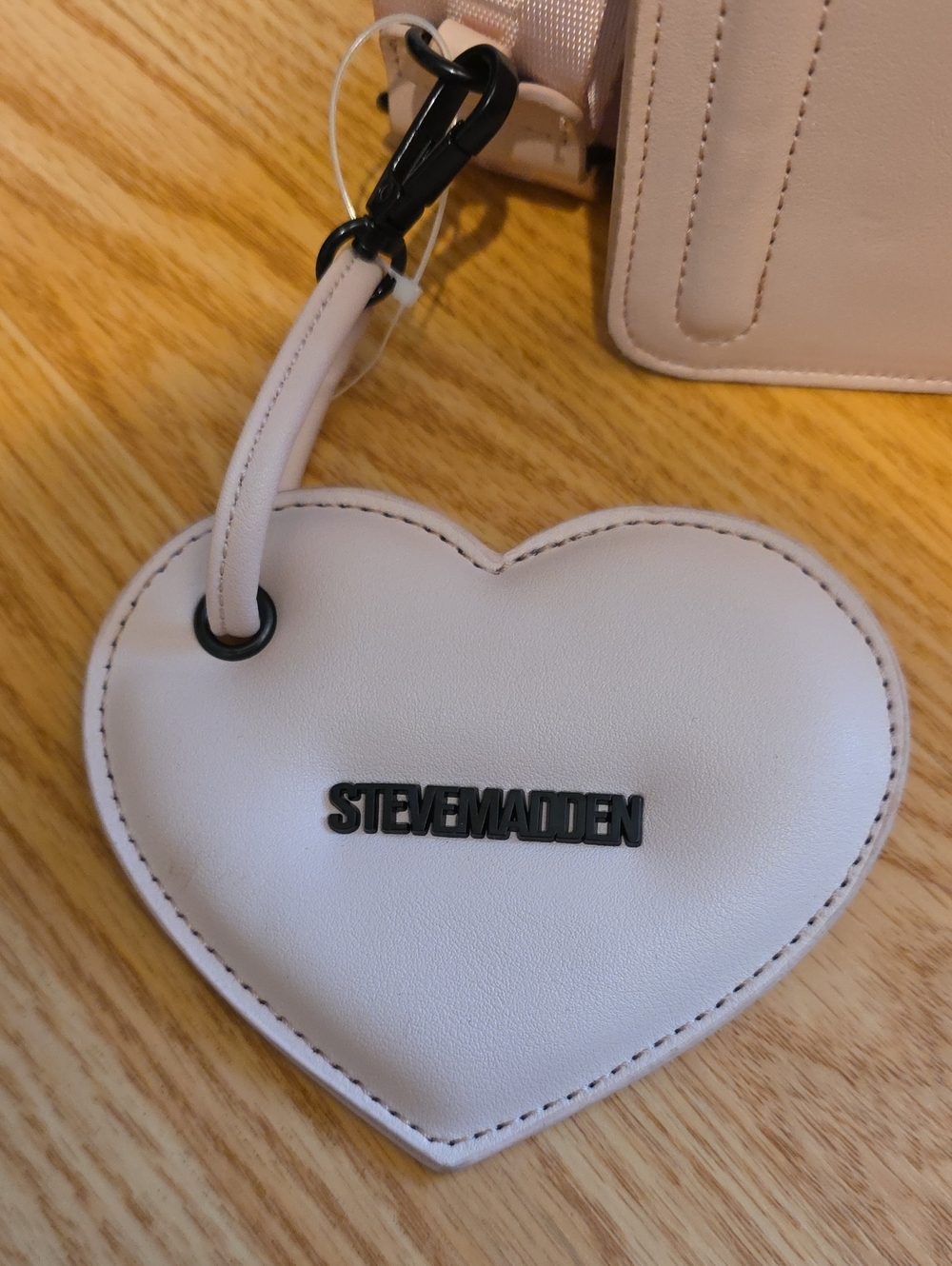 Steve Madden White Crossbody with Black Bats Logo - Picture 5 of 12